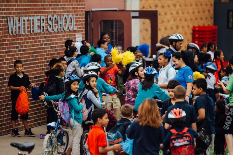 Students and guests gather at Whittier Elementary for Bike to School Day in 2015.