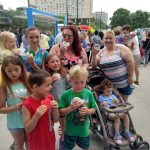 Family enjoys Pride cookies at PrideKC Kick-Off Celebration