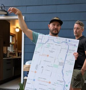 Kiley Sutter presents a map at a meeting for the Hale Cook Bike Bus.