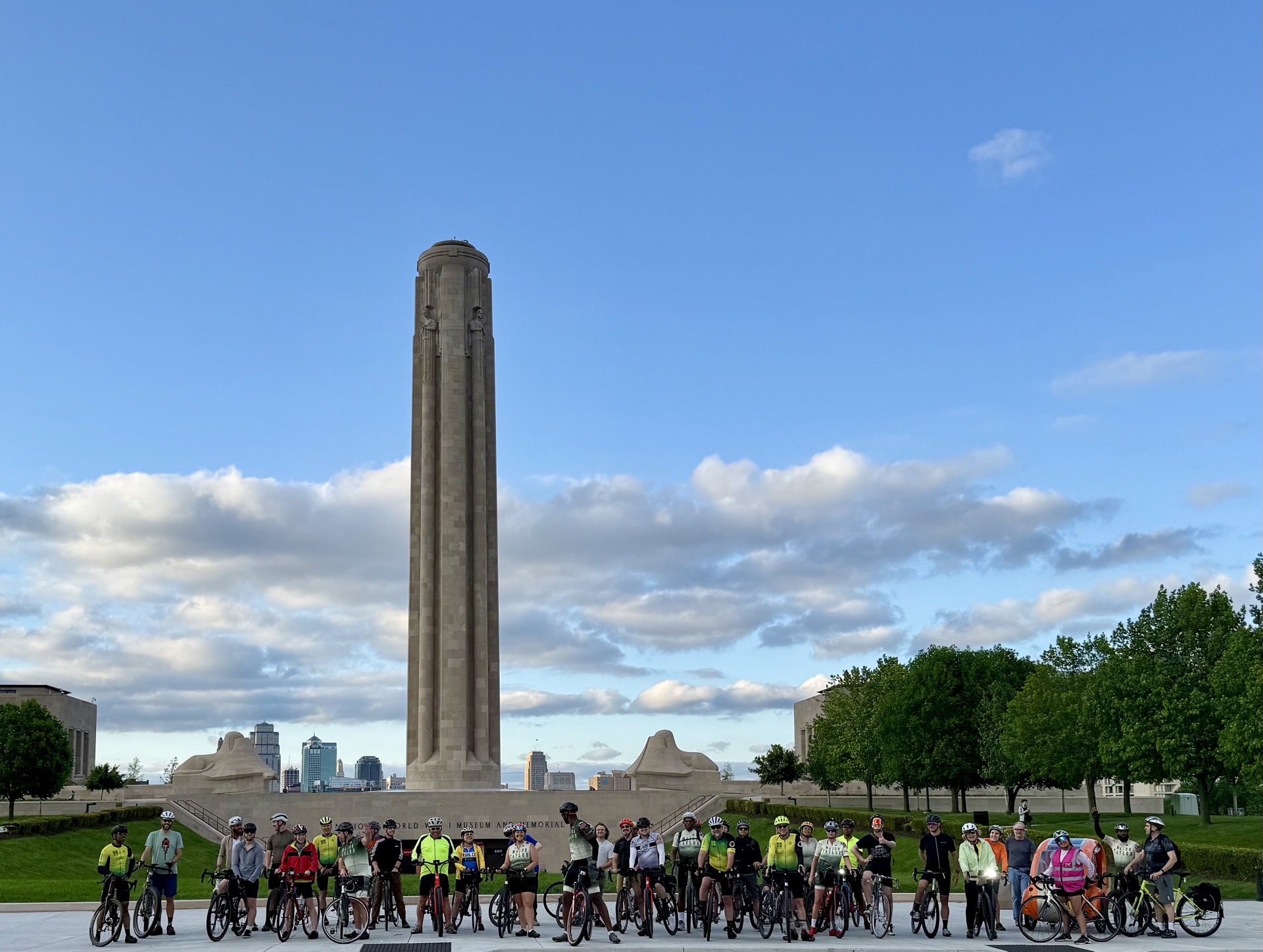 Major Taylor Cycling Club of Kansas City poses with BBC reporters at the National WWI Memorial